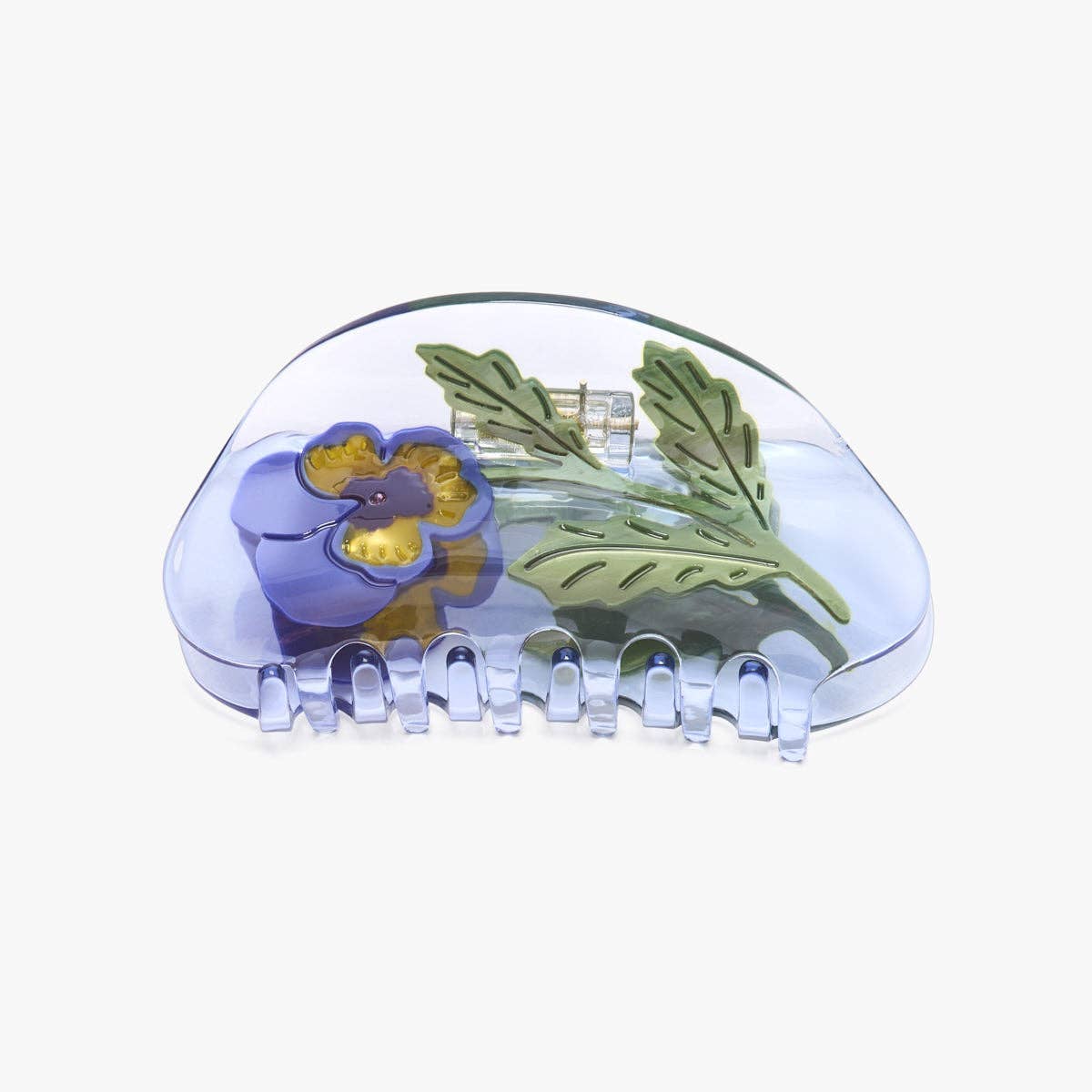 Hair clip with purple flower and green leaves design on a white background. Viola Purple Pansy Hair Claw Clip
