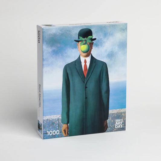 René Magritte - Son of Man Puzzle Did you know: This painting was a featured element in the plot of the 1999 movie (remake), The Thomas Crown Affair, with Pierce Brosnan and Rene Russo. If you're an art lover - you MUST watch it!