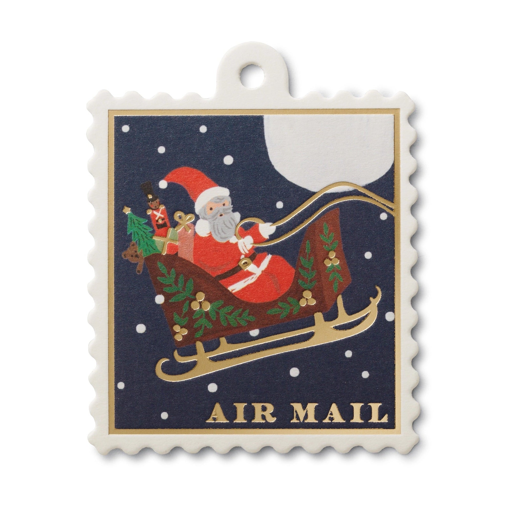 A square gift tag featuring an illustration of Santa Claus on a sleigh with metallic gold foil details, and the text 'AIR MAIL' across the bottom.