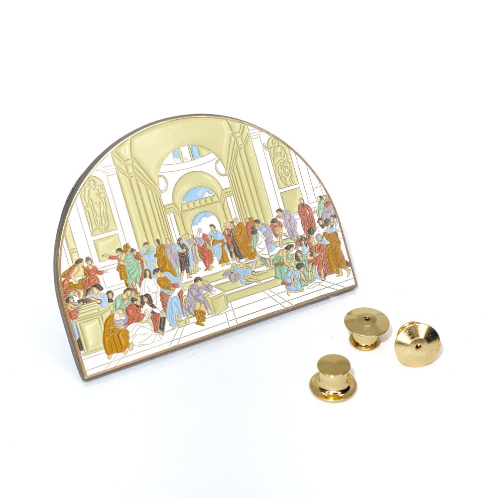 Painted by Raphael in 1509-11, The School of Athens fresco has made a lasting impact. Captivating the Vatican’s wall, this work depicts some of the greatest minds, including Plato, Aristotle, and Socrates. Whether you like art, philosophy, or history, this mega pin will bring upon compliments, smiles, and some pondering of life’s biggest questions. P.S. Can you spot where Raphael painted himself? Details: 2.75" x 2” Enamel Pin 3 Metal Locking Clasps By Pin Museum