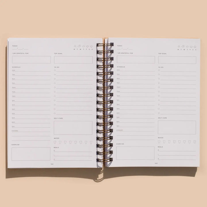 The Self-Care Planner begins with The Self-Care Plan: six steps designed to help you reflect on your current self-care practices, recognize areas where you can improve, and generate ideas for new self-care activities you enjoy. The planning features include monthly and weekly goal setting; daily, weekly, & monthly planning pages; monthly reflection & road map; year at a glance page; 27 additional notes pages; and quotes by inspiring women!