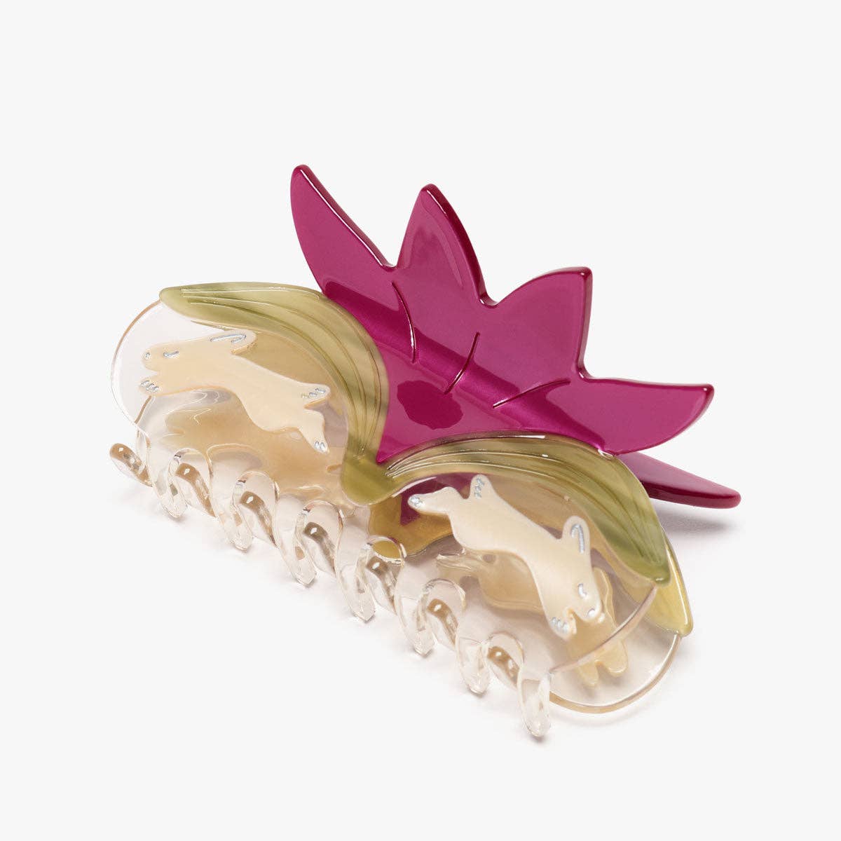 Hair clip with pink and green design on a white background