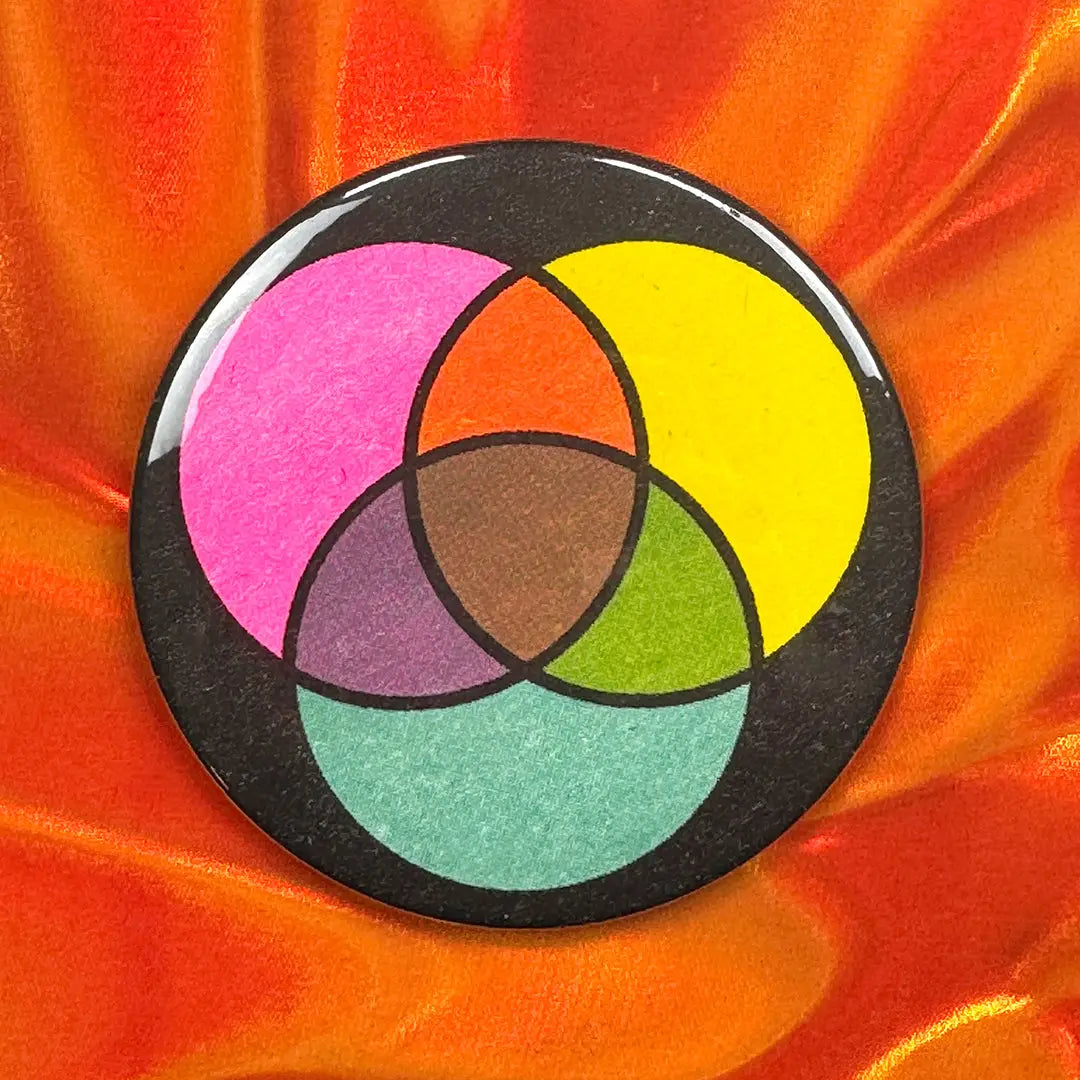 Color wheel design on a colorful fabric background