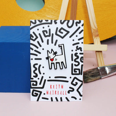 The ‘cat artist' enamel pin range is a feline reimagining of some of the greatest artists of all time.  The 'Keith Hairball' pin is a feline interpretation of pop art legend, Keith Haring (1958 - 1990) now reimagined as 'Keith Hairball.’  Did you know: Kieth Haring was born in Reading, Pennsylvania - only about an hour and a half from our store in Swarthmore, PA!