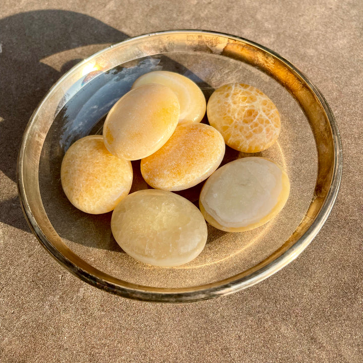 Orange Calcite - Pillow Palm Stone