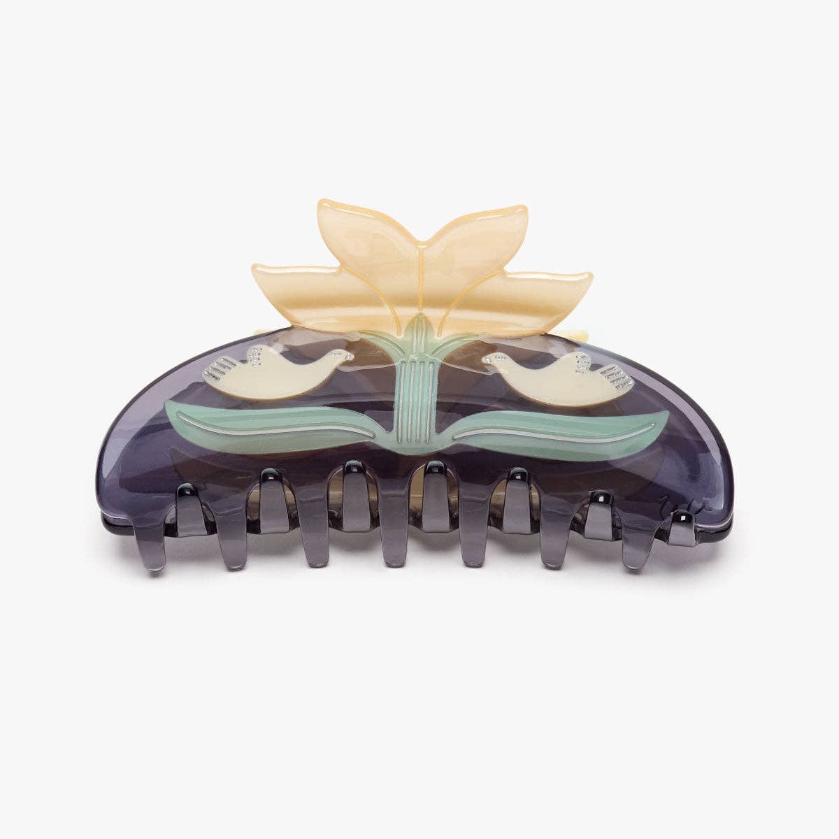 Decorative hair clip with lotus flower design on a white background