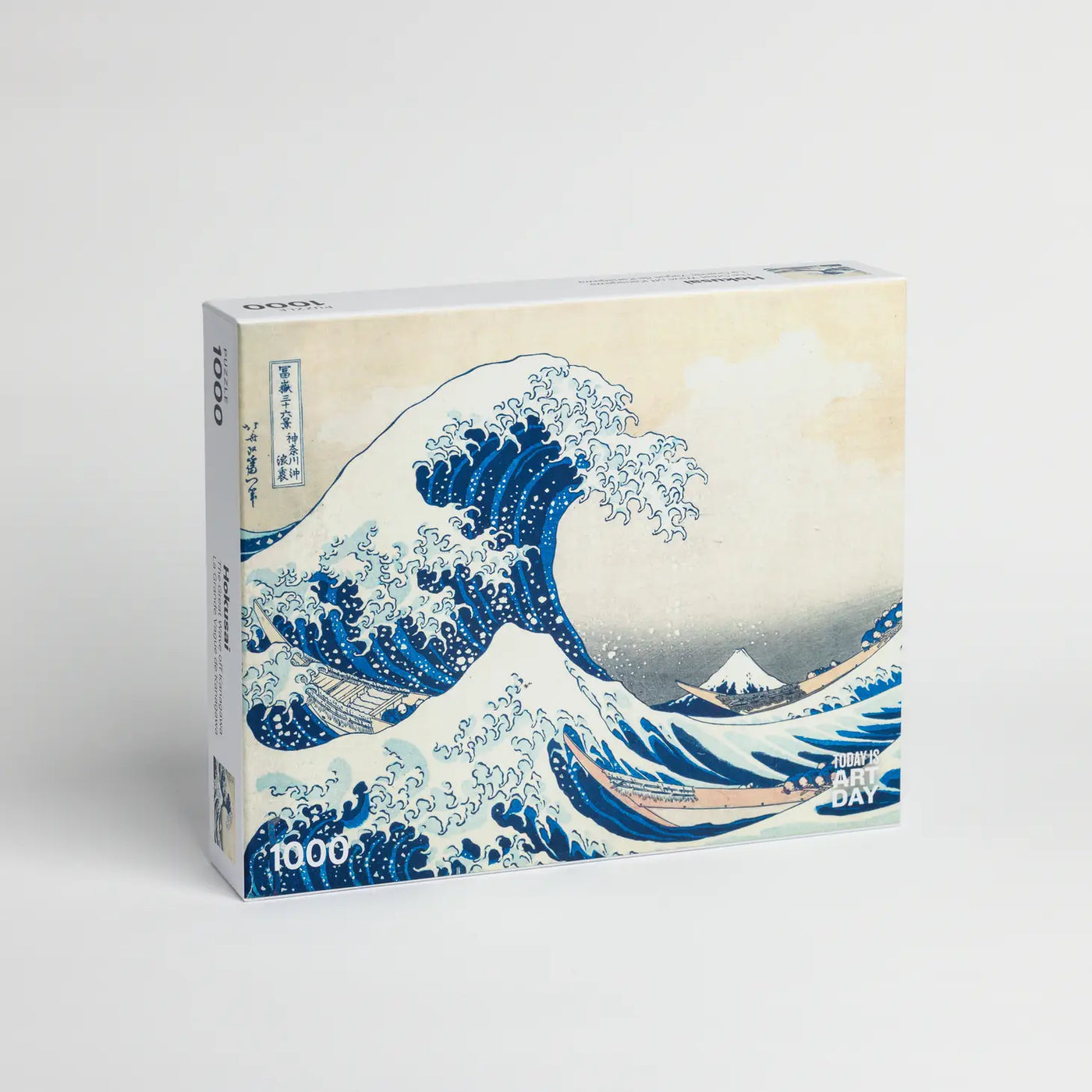 The Great Wave Off Kanagawa is a woodblock print by the Japanese ukiyo-e artist Hokusai. It is part of Hokusai’s thirty-six views of Mount Fuji series that secured his fame both in Japan and overseas. The mountain with a snow-capped peak is Mount Fuji, which in Japan is considered sacred and a symbol of national identity. Sometimes assumed to be a tsunami, the wave is more likely to be a large rogue wave. It is about to strike three boats, symbolizing the force of nature and the weakness of human being