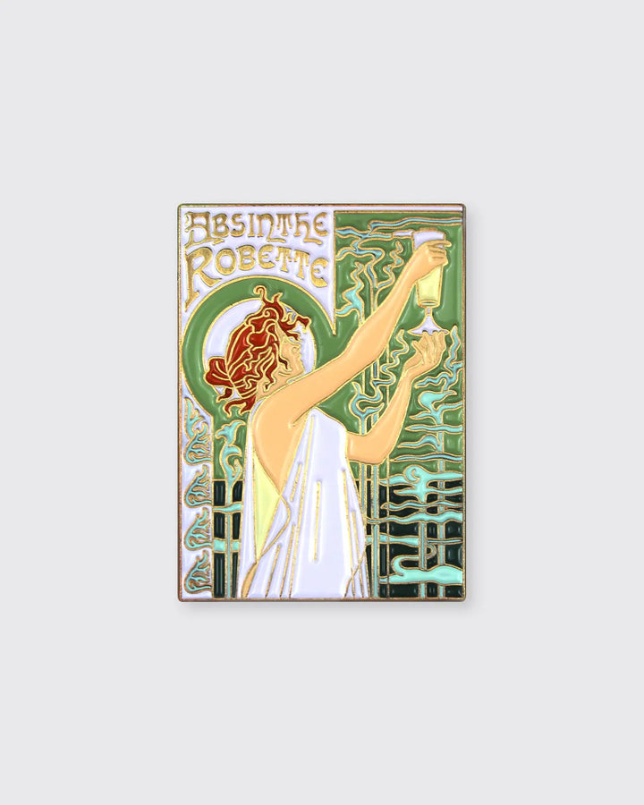 This Absinthe Robette Pin features a classic and elegant design inspired by Henri Privat-Livemont's (1861-1936) revered masterpiece. Perfect for expressing your admiration for this iconic work of art, this pin is sure to be the start of your wearable art collection.