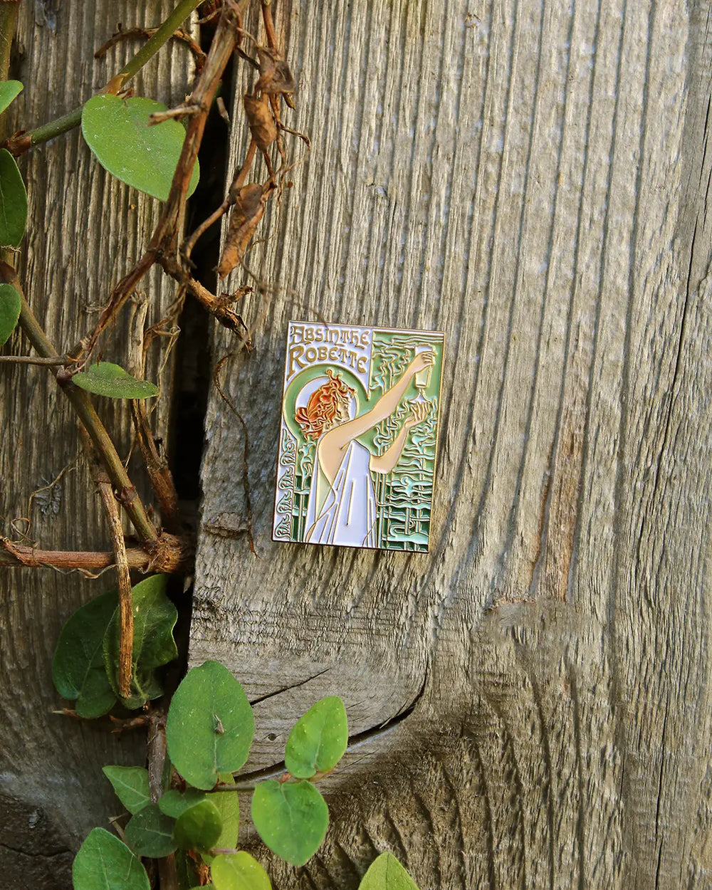 This Absinthe Robette Pin features a classic and elegant design inspired by Henri Privat-Livemont's (1861-1936) revered masterpiece. Perfect for expressing your admiration for this iconic work of art, this pin is sure to be the start of your wearable art collection.