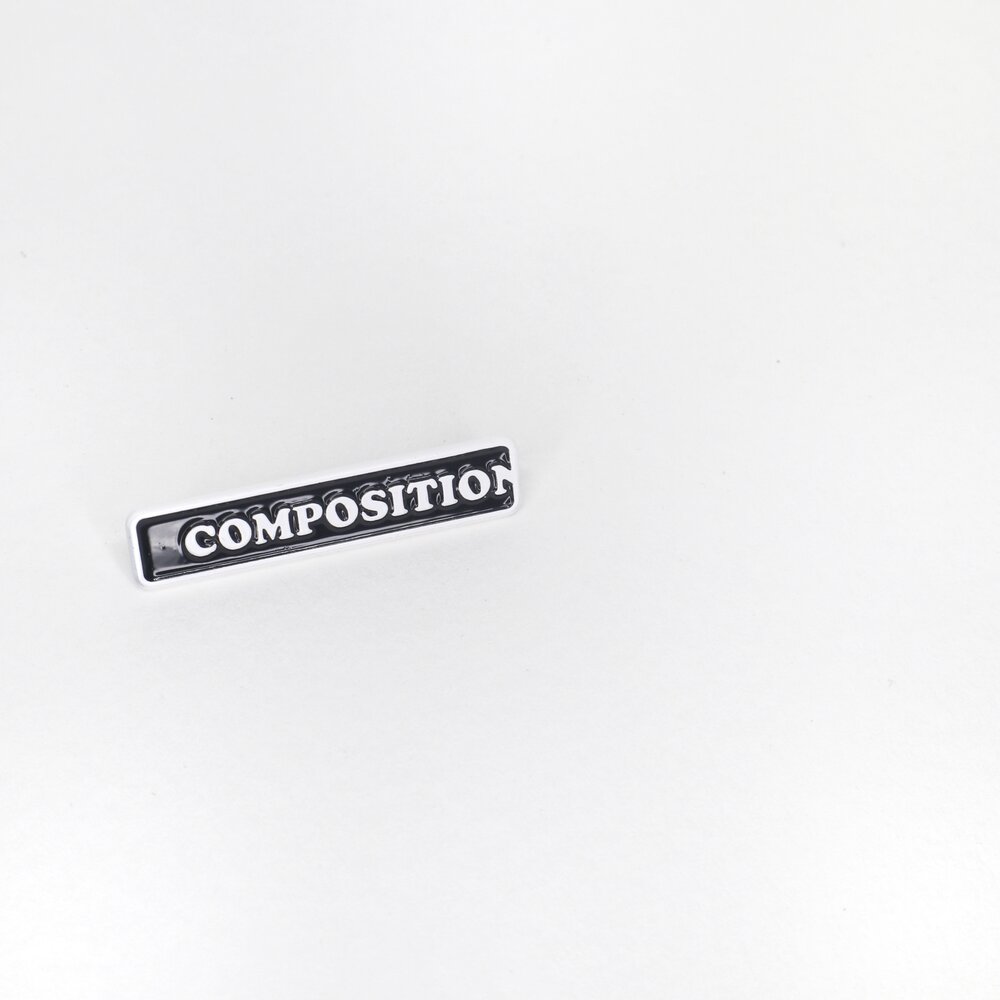 Show off your art + design lingo with this composition is everything pin. Whether you’re heading to a coffee shop, the studio, or your local museum, let the world know you see everything.