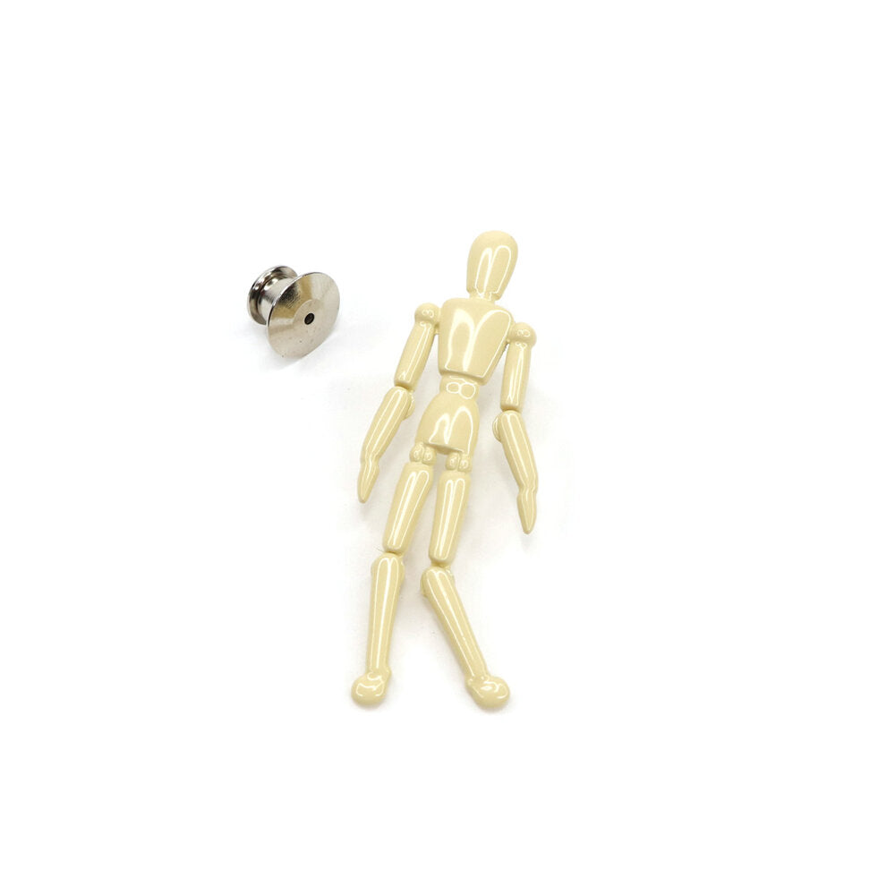 He’s pretty comfortable staying in the way you situate him so that you can move this little mannequin’s arms up to his elbows and his legs up to his knees!  P.S. The perfect companion for any artist’s bag!  Details: 2" x .6” Interactive Enamel Pin 4 Points of Articulation Metal Locking Clasp  By Pin Museum